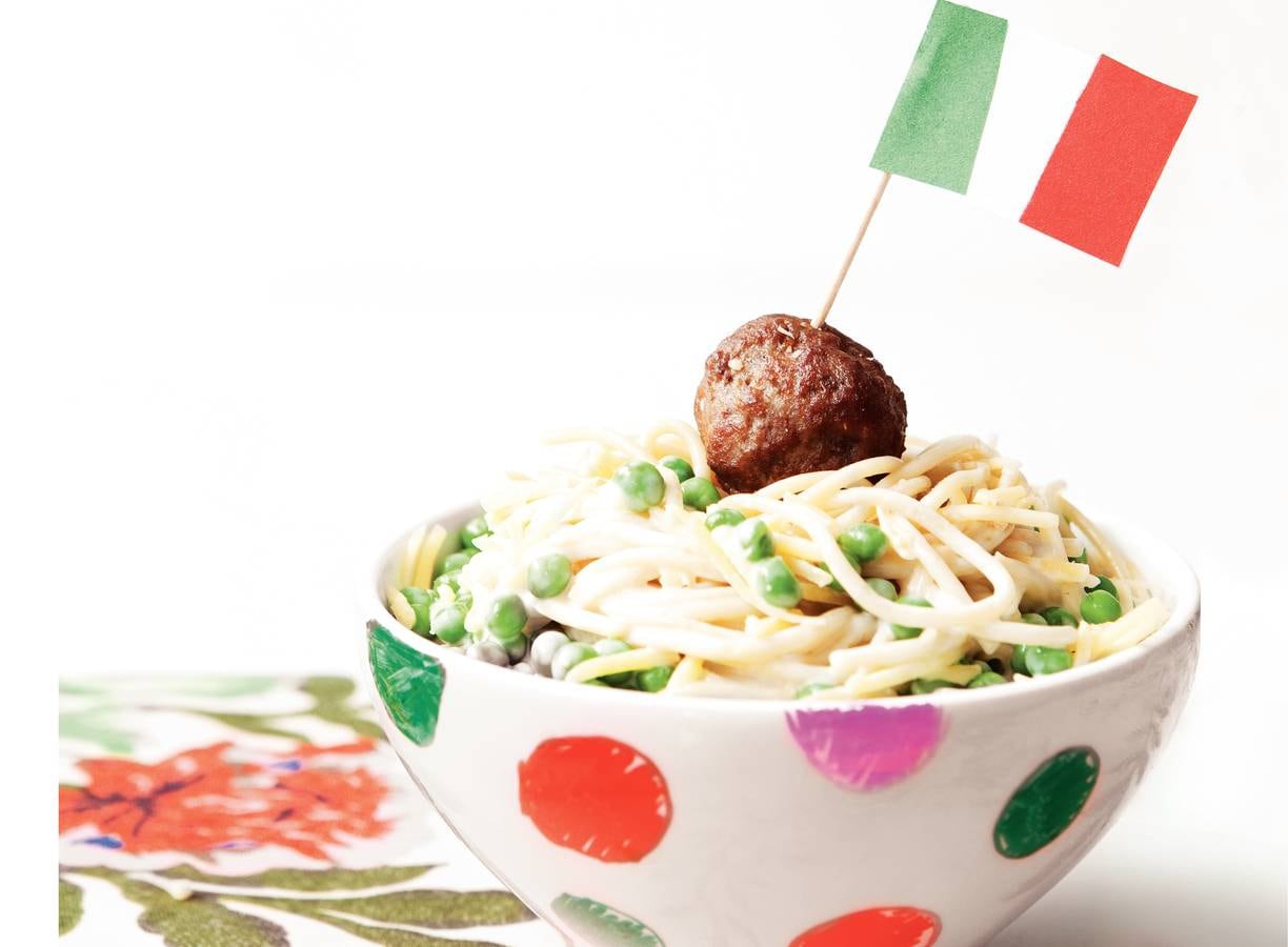 Roomspaghetti met runderballetjes en tuinerwten