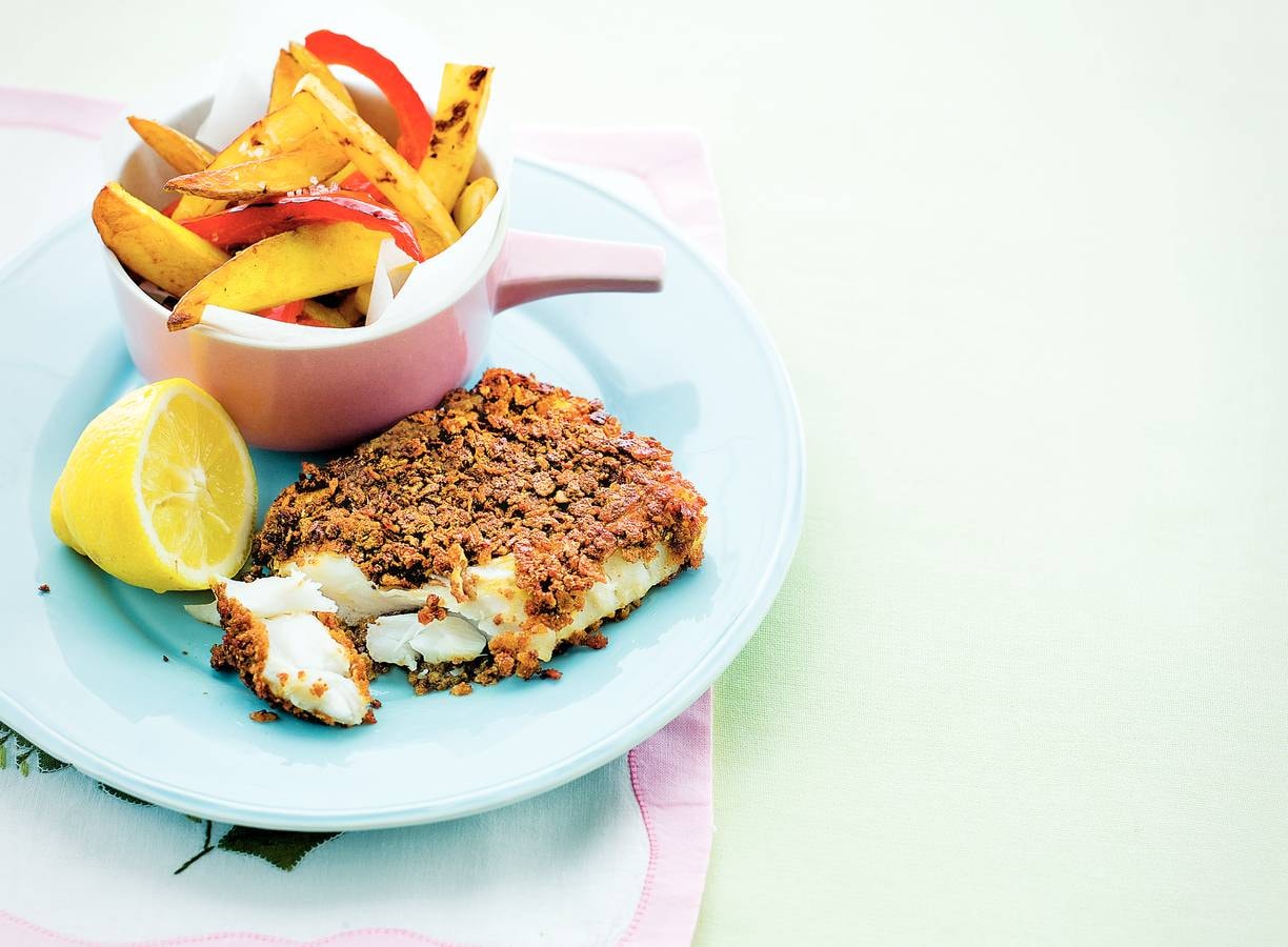 Krokante vis met gele en rode friet