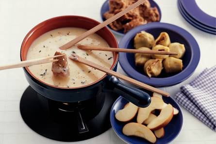 Geitenkaasfondue met honing en tijm