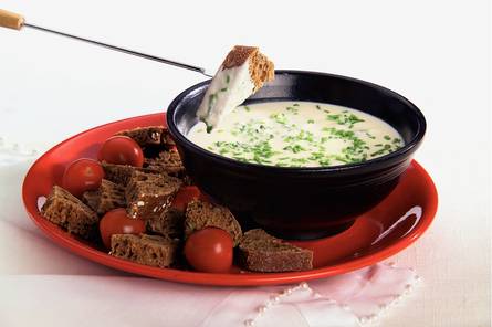 Kaasfondue met zachte geitenkaas