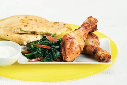 Tandoori drumsticks met spinazie