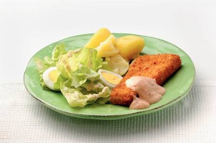 Zeeschnitzel met honing-mosterddressing