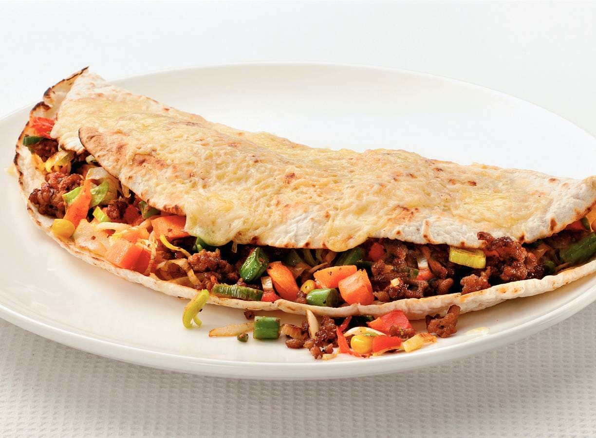 Gegratineerde tortilla's met Mexicaans gehakt