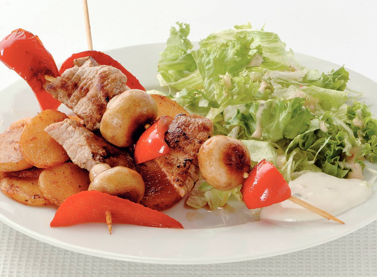 Kalfsschnitzelspies met aardappelschijfjes