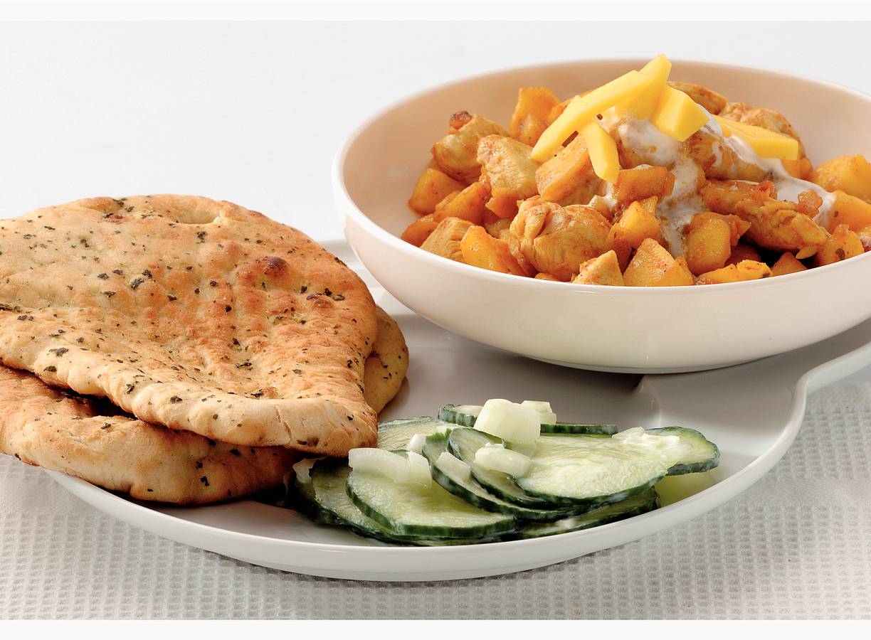 Fruitige kipcurry met naanbrood