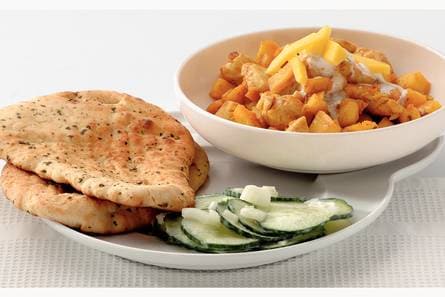 Fruitige kipcurry met naanbrood