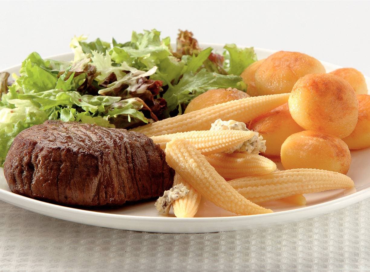 Pittige gegrilde biefstuk met maïs
