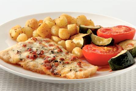 Kabeljauw en tomaat en courgette uit de oven