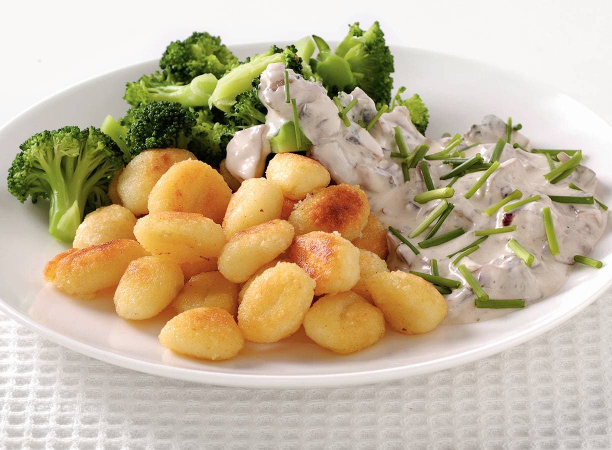 Gnocchi met champignonroomsaus en broccoli