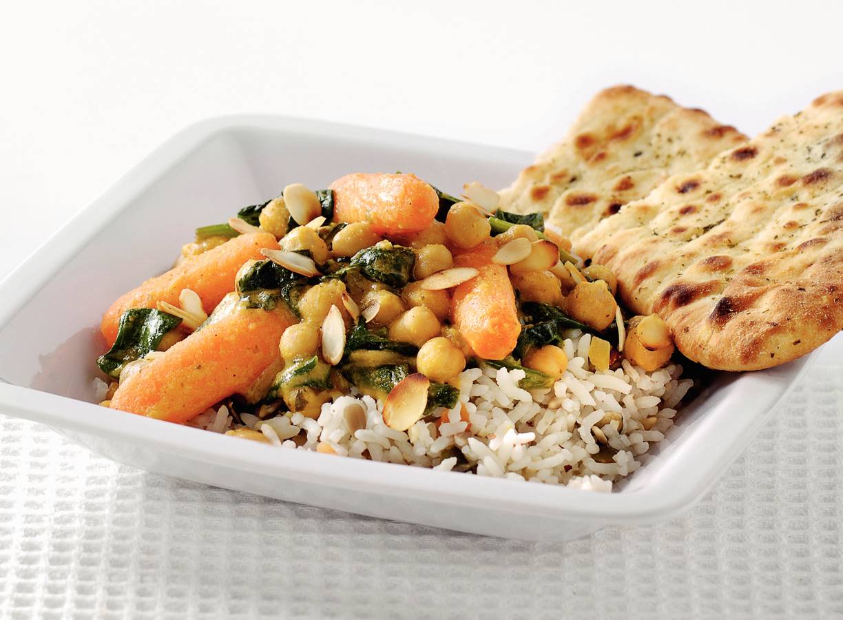 Groentekorma met notenrijst en naan