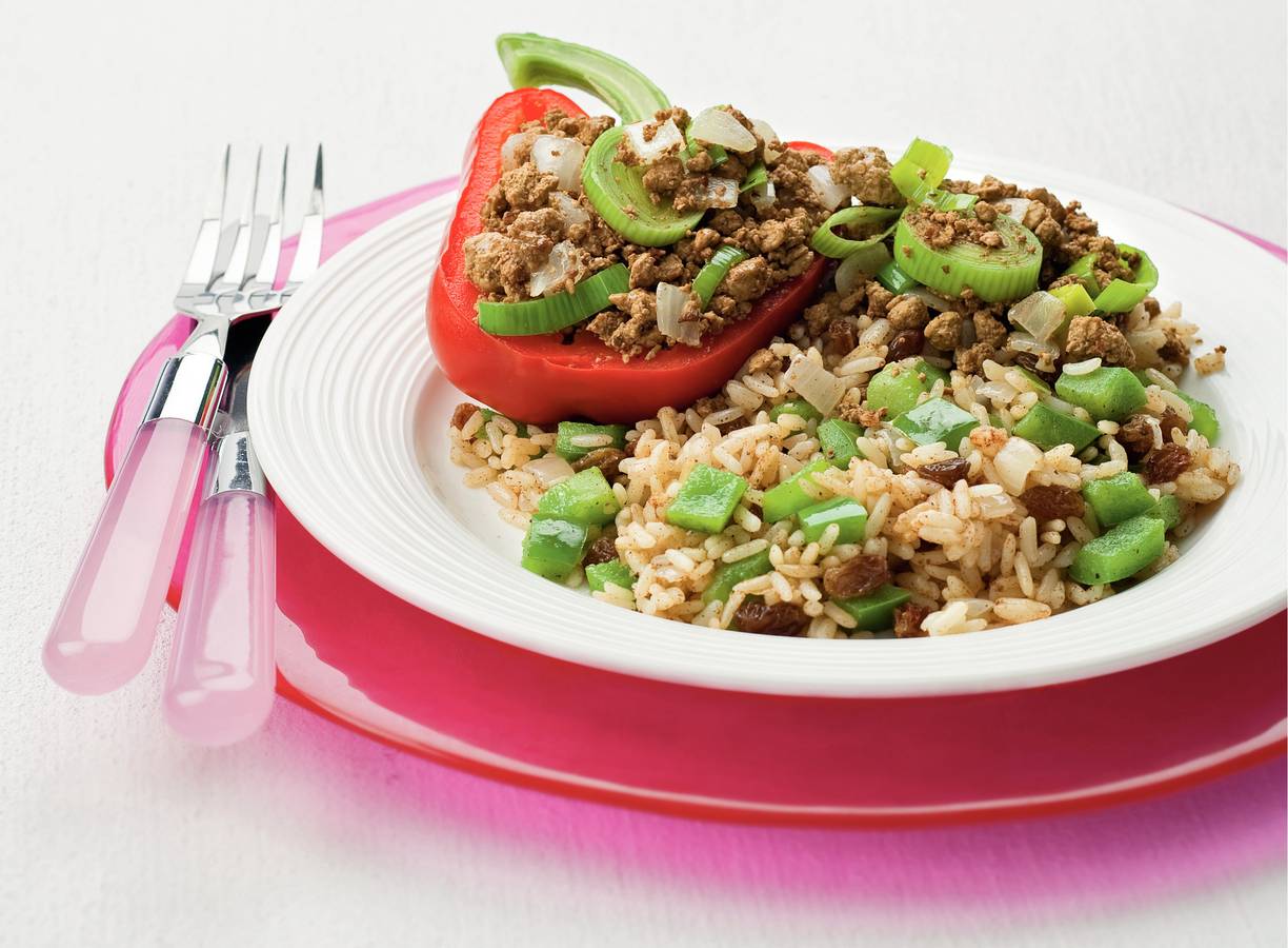 Gevulde paprika's met rozijnenrijst