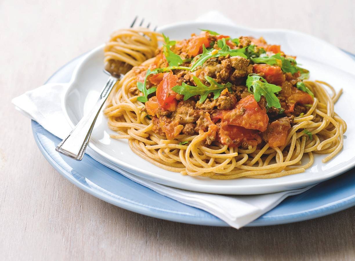 Spaghetti met tomatensaus en rucola