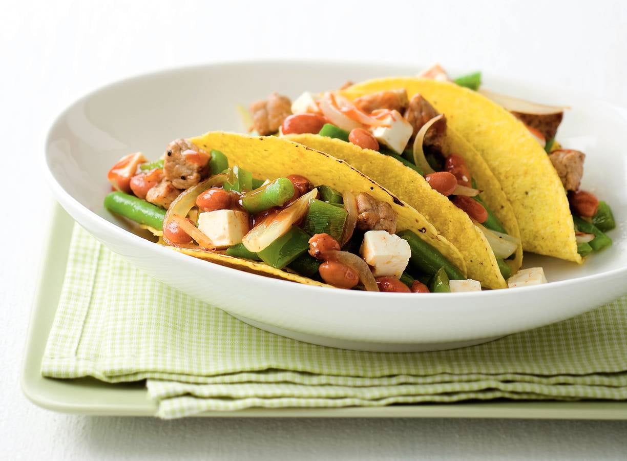 Taco's met varkensvlees en witte kaas