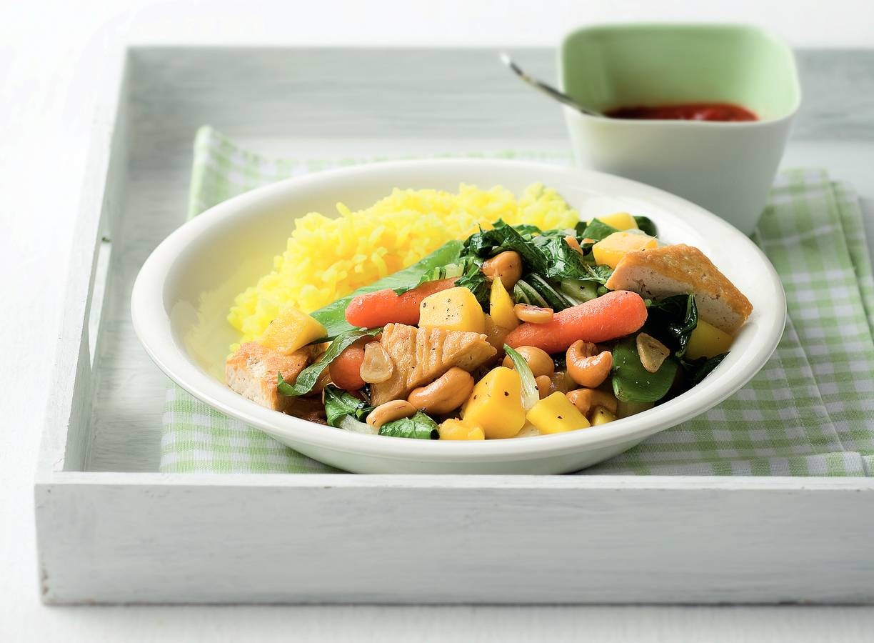 Tofu met peultjes, mango en cashewnoten