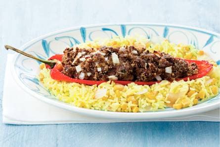 Gevulde puntpaprika's met gele rijst