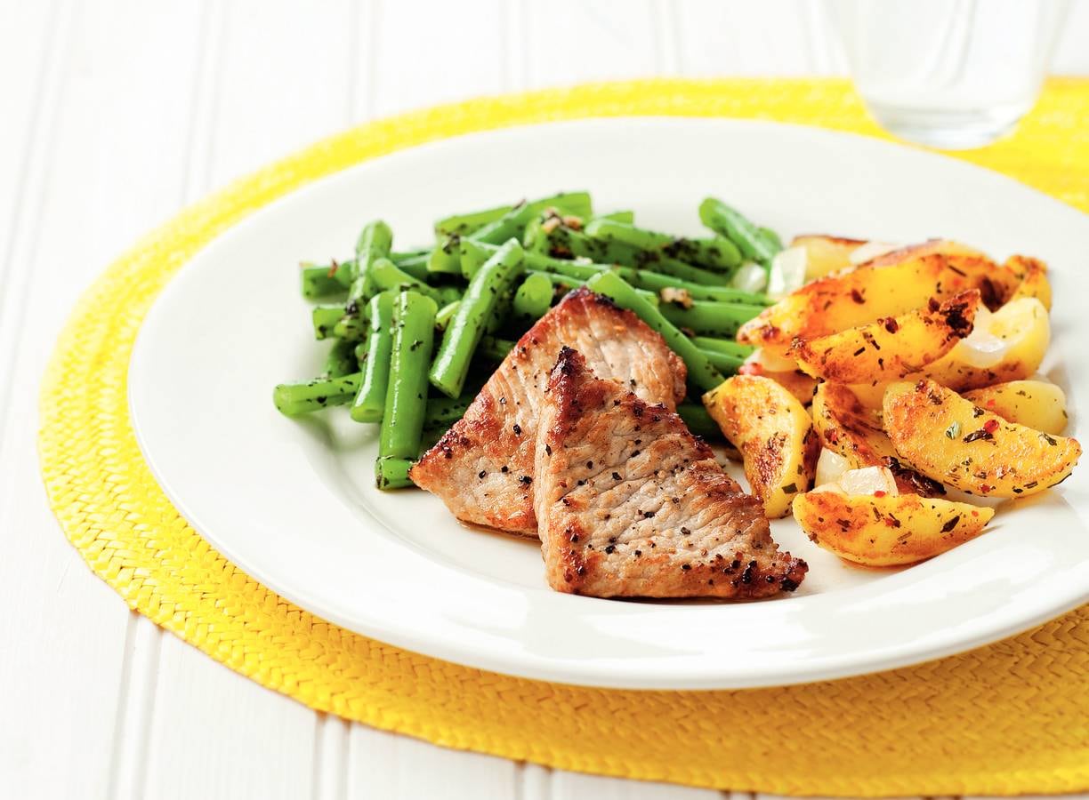 Schnitzel met knoflookboontjes