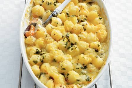 Gegratineerde vis en gegratineerde krieltjes
