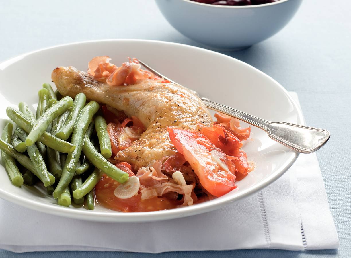 Kip met tomaten en ham uit de oven