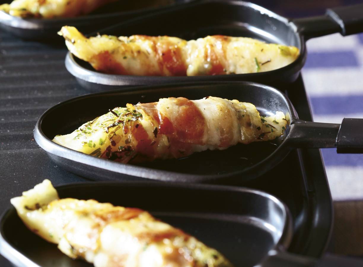 Pangasiusrolletjes met ontbijtspek