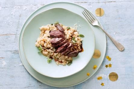 Duivenborstfilet met kruidenrisotto en zoete sherryjus
