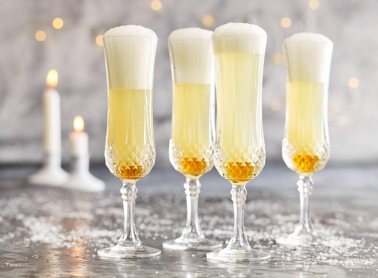 Cava met een scheutje perensap en honing