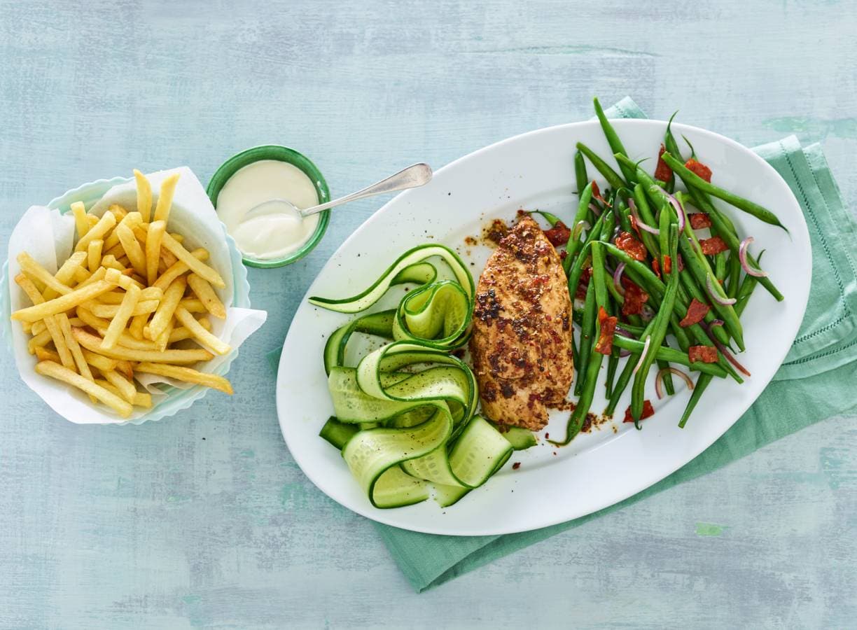 Malse scharrelkip met een Caribische touch en spicy bonen