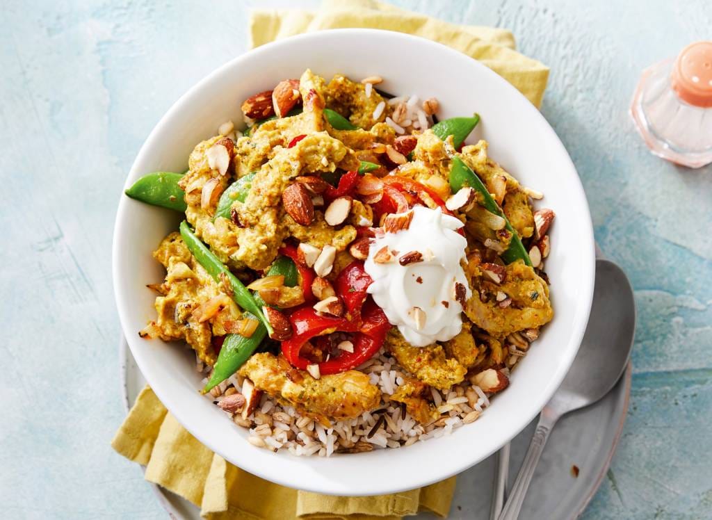 Indiase curry met in yoghurt gemarineerde kip