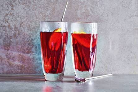 Warm herfstdrankje met cranberry, kaneel & sinaasappel