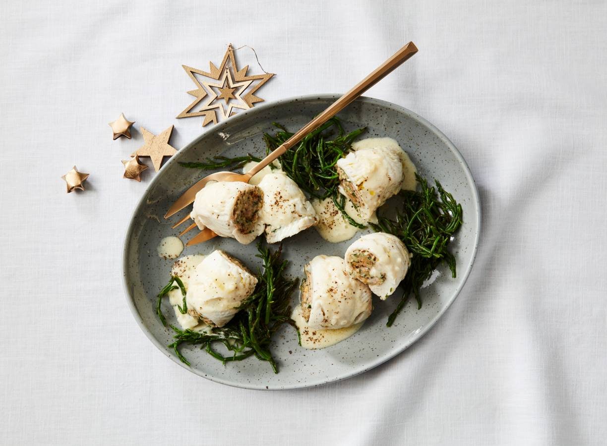 Scholrolletjes met zalm in wittewijnsaus
