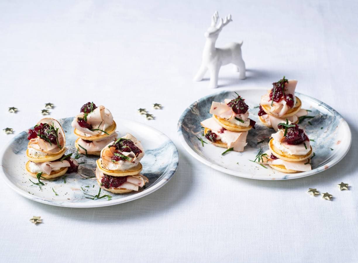 Blini’s met citroenricotta, kipfilet & cranberrysaus
