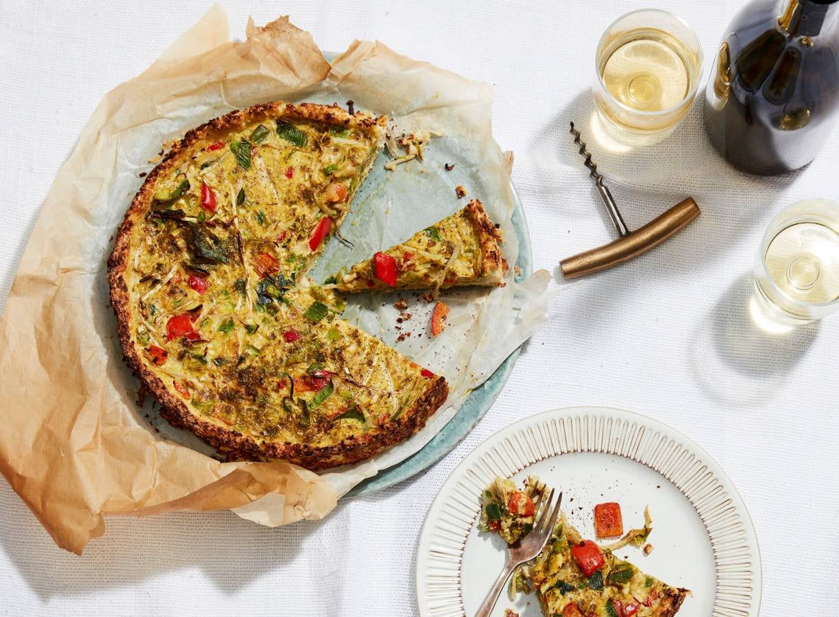 Bloemkoolbodemquiche met groente en kokosmelk