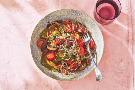 Ravioli met paddenstoelen, tomaatjes & pancetta