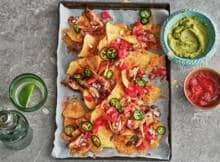 Fiesta Mexicana! Deze nachoschotel staat garant voor een feestje in je mond.