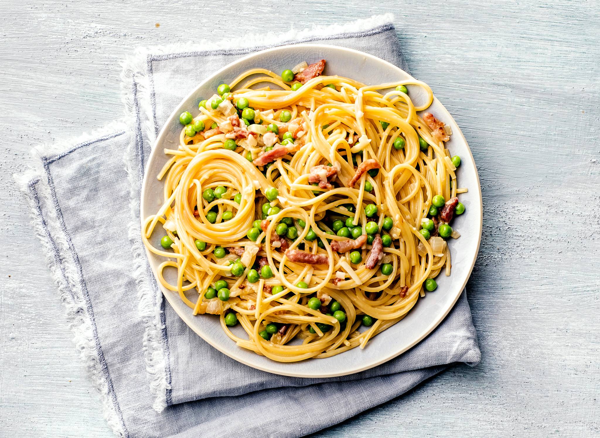 Spaghetti carbonara met tuinerwten recept Allerhande Albert Heijn