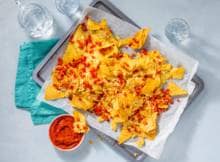 Het is borreltijd! En ja, daar horen natuurlijk nachos met flink veel kaas bij.