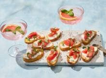 De ultieme smaaksensatie: bruschetta met ricotta, grapefruit en basilicum - de perfecte match voor jouw borrel!