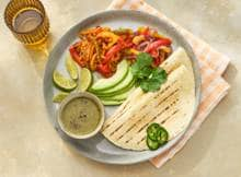 Fajitas zijn in de jaren 30 ontstaan toen landarbeiders gevulde tortilla’s als lunch meenamen. Kenmerkend is vulling van reepjes, oorspronkelijk van rund of kip en in deze versie plantaardig.  