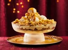 Appelcrumble met karamelpopcorn en custard