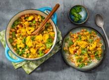 Bloemkoolcurry met zilvervliesrijst en tuinerwten